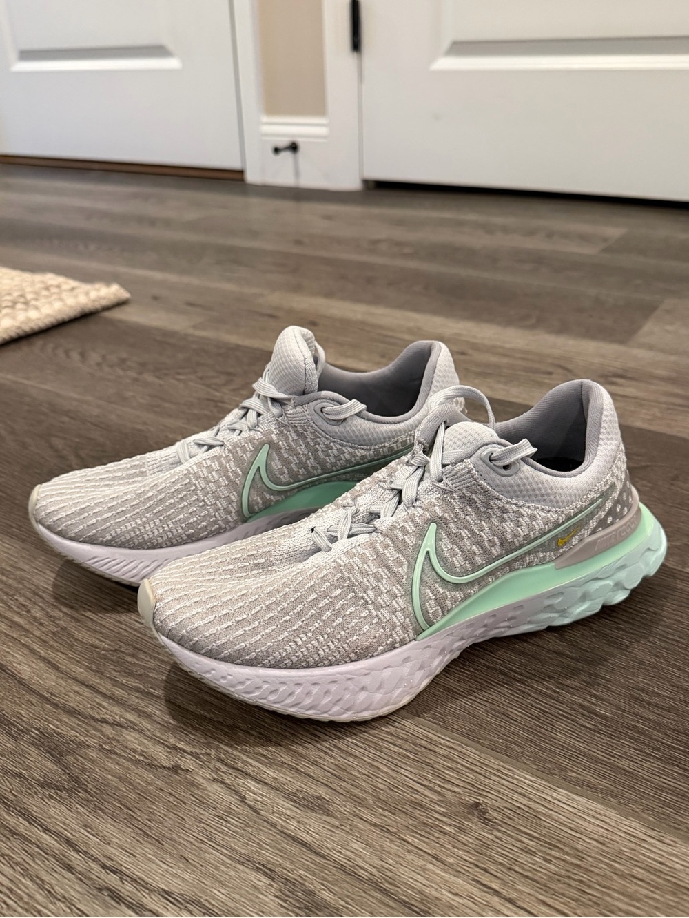 Nike • React Women's Running Shoes - Light Gray with Mint Green Accents